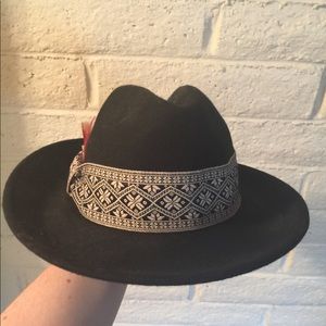 Black hat with feathers